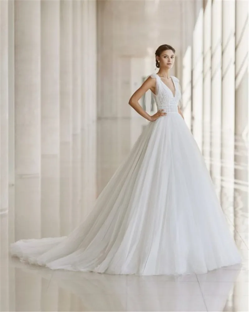 Elegant V-Neck Ball Grown Wedding Dress Luxury Draped Tulle Bridal Gown Backless vestido de noiva
Elegant V-Neck Ball Grown Wedding Dress Luxury Draped Tulle Bridal Gown Backless vestido de noiva