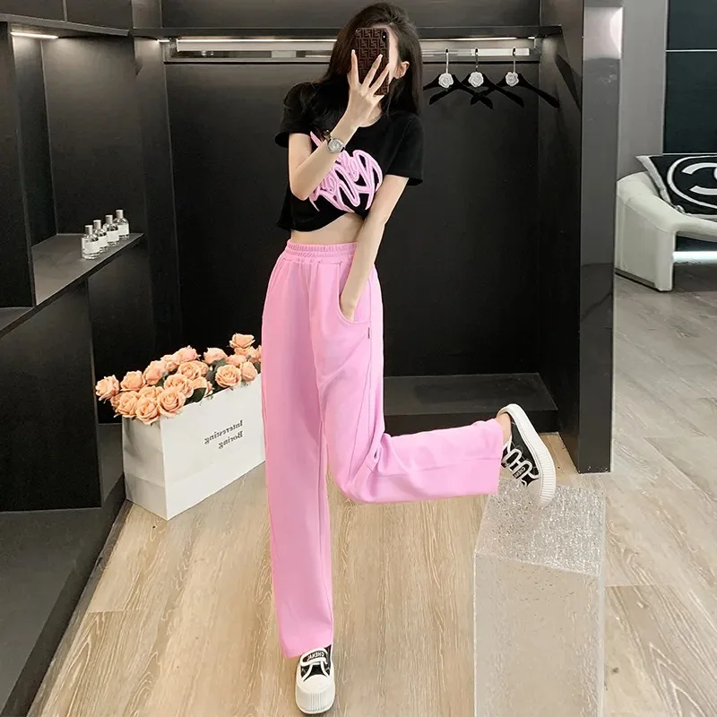 Fashion Pink Trousers Two Piece Set for Women 2023 Summer Short Sleeved Tshirt + Elastic Waist Casual Wide Leg Pants Sports Suit
Fashion Pink Trousers Two Piece Set for Women 2023 Summer Short Sleeved Tshirt + Elastic Waist Casual Wide Leg Pants Sports Suit