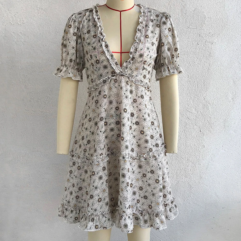 Stand Out from the Crowd with this Beautiful and Feminine Women's Short Dress with Deep V Neckline and Floral Print
Stand Out from the Crowd with this Beautiful and Feminine Women's Short Dress with Deep V Neckline and Floral Print