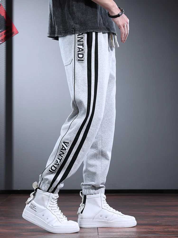 Sport Jogging Pants Men Fashion Side Stripe Letter Print Gray Lightweight Baggy Elastic Waist Drawstring Trousers
Sport Jogging Pants Men Fashion Side Stripe Letter Print Gray Lightweight Baggy Elastic Waist Drawstring Trousers
