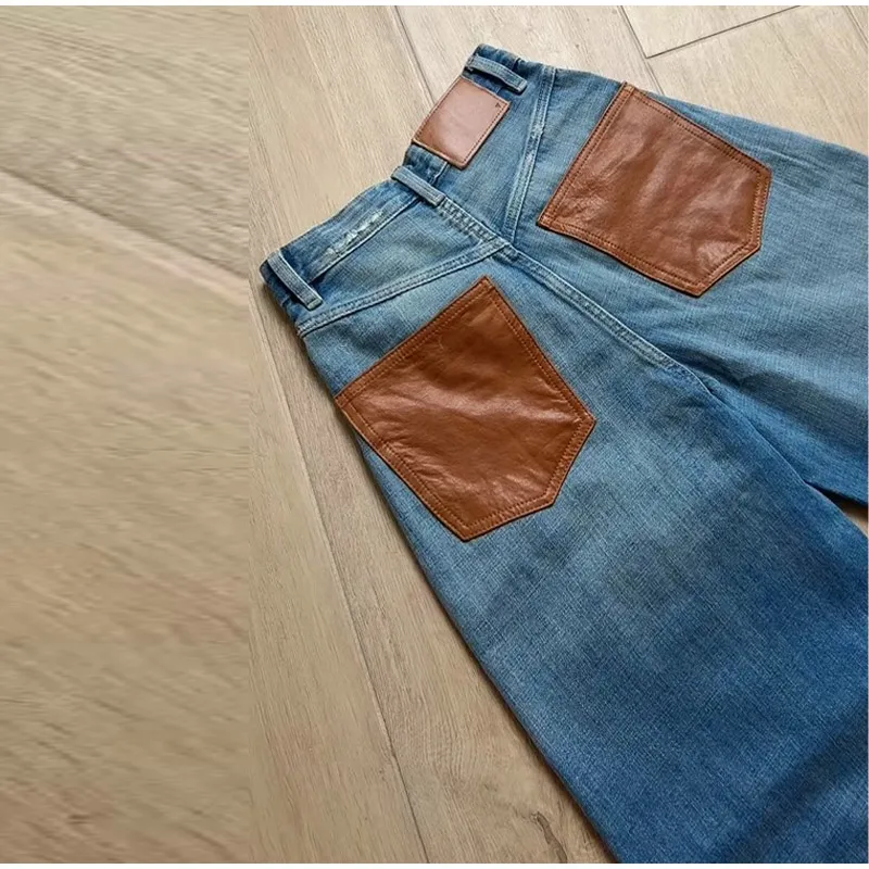 بنطلون نسائي واسع الساق من الجلد الصناعي مع جيوب، خصر مرتفع، تصميم فضفاض، مناسب للارتداء اليومي والتنقل، أزياء الشارع، ربيع 2026 بنطلون نسائي واسع الساق من الجلد الصناعي مع جيوب، خصر مرتفع، تصميم فضفاض، مناسب للارتداء اليومي والتنقل، أزياء الشارع، ربيع 2026