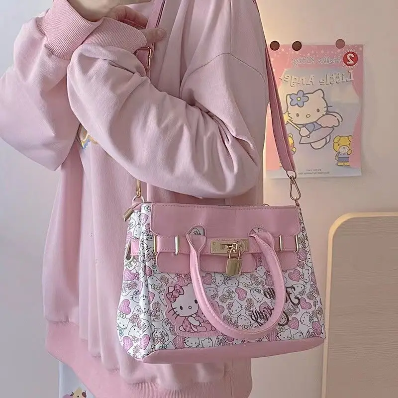 Sanrio New Hello Kitty Kawaii Anime Handbag Cute Cartoon Large Capacity Shoulder Bag Hand Sweet Crossbody Bag Student Gift Toys
Sanrio New Hello Kitty Kawaii Anime Handbag Cute Cartoon Large Capacity Shoulder Bag Hand Sweet Crossbody Bag Student Gift Toys