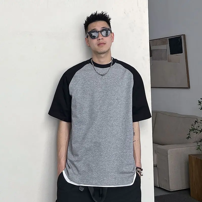 Korean men splicing handsome round neck T-shirt men short-sleeved top summer casual loose half-sleeved high-end simple style top
Korean men splicing handsome round neck T-shirt men short-sleeved top summer casual loose half-sleeved high-end simple style top