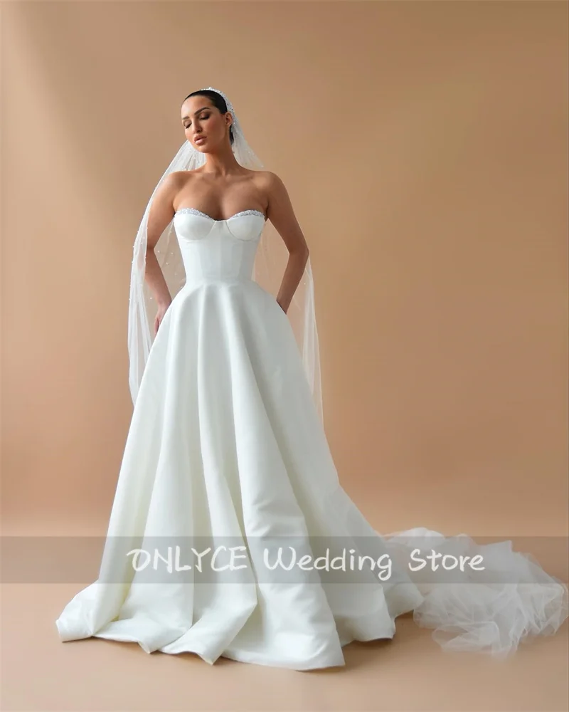 New Exquisite Satin 2023 Simple Wedding Gowns With Veil Sweetheart Bridal Dress Bridal Gowns Beads Pearls Robe De Mariee
New Exquisite Satin 2023 Simple Wedding Gowns With Veil Sweetheart Bridal Dress Bridal Gowns Beads Pearls Robe De Mariee
