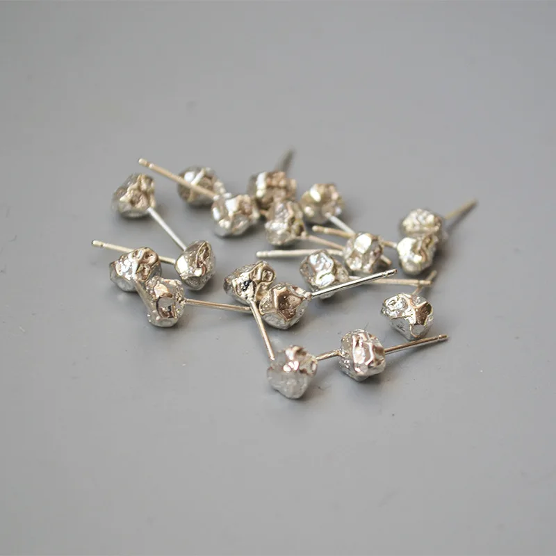 Textured Irregular Silver Golden Volcanic Lava Stone Shape 925 Silver Needle Unisex Design Stud Earrings
Textured Irregular Silver Golden Volcanic Lava Stone Shape 925 Silver Needle Unisex Design Stud Earrings