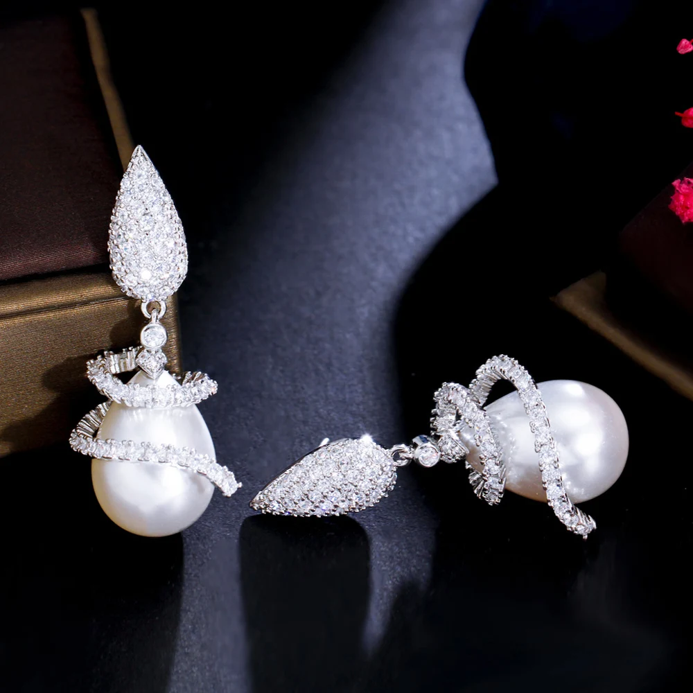 ThreeGraces Elegant Sparkly Cubic Zirconia Simulated Pearl Bridal Wedding Statement Earrings for Women New Trendy Jewelry E1022
ThreeGraces Elegant Sparkly Cubic Zirconia Simulated Pearl Bridal Wedding Statement Earrings for Women New Trendy Jewelry E1022