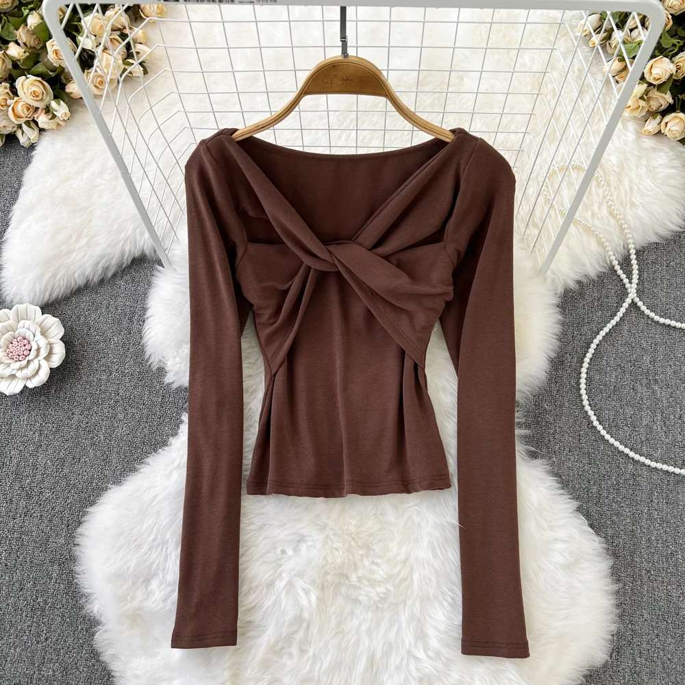 Винтажная футболка для похудения с длинными рукавами и бантом
Винтажная футболка для похудения с длинными рукавами и бантом