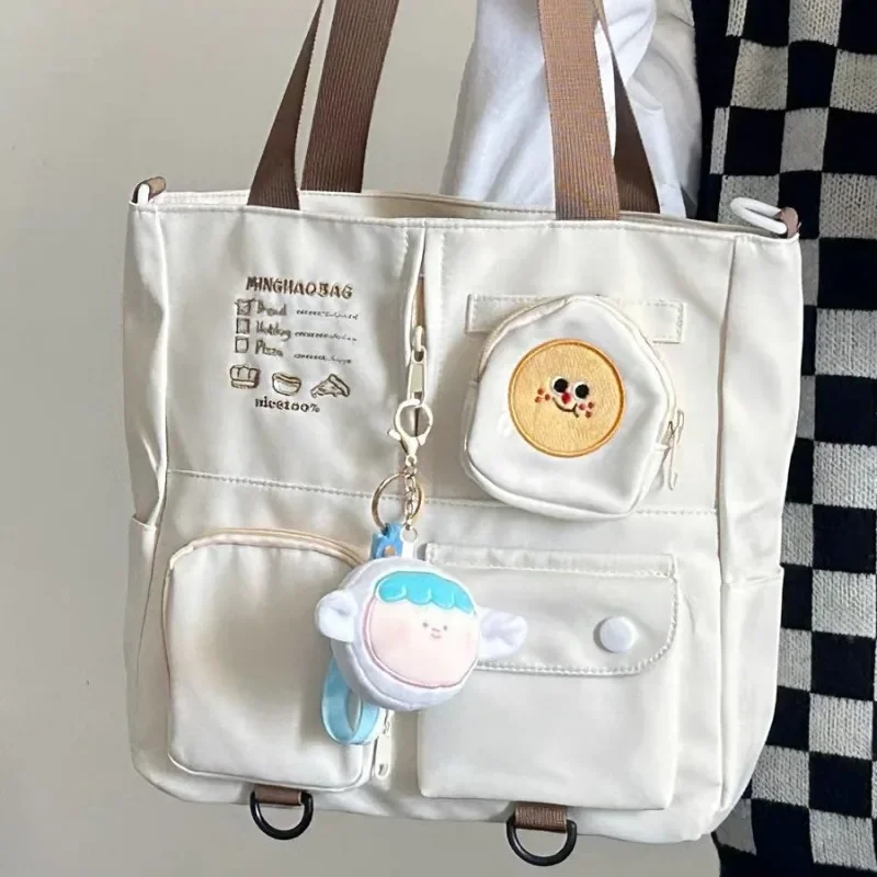 MBTI Korean Fashion Cute Womens Tote Bag Nylon Waterproof Student Class Casual Shoulder Bag Large Capacity Embroidery Handbag
MBTI Korean Fashion Cute Womens Tote Bag Nylon Waterproof Student Class Casual Shoulder Bag Large Capacity Embroidery Handbag