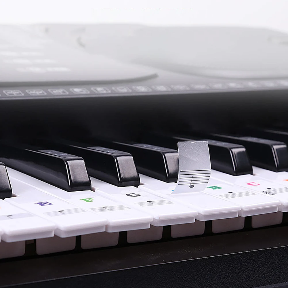 Piano Keyboard Sticker 1pc 22.7 * 24.6cm Beginner Colorful For 88/61/54/49/37Key Keyboard Stickers Transparent
Piano Keyboard Sticker 1pc 22.7 * 24.6cm Beginner Colorful For 88/61/54/49/37Key Keyboard Stickers Transparent