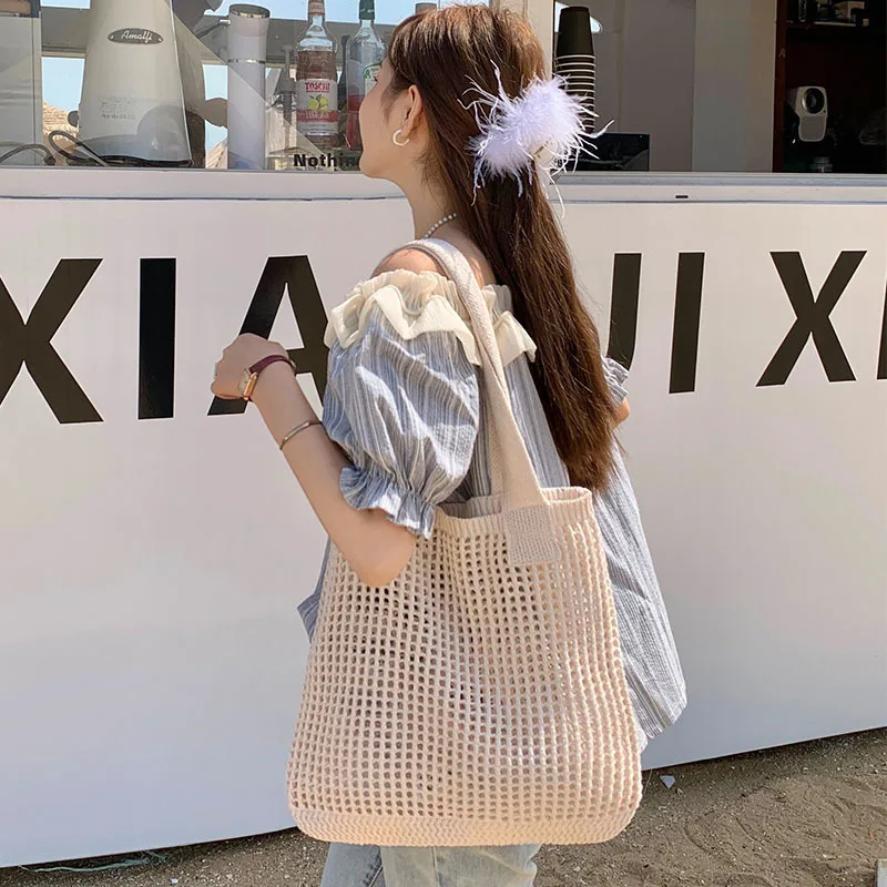 Summer niche all-in-one knitted bag simple woven bag mesh hollowed-out women's shoulder bag Tote Tote
Summer niche all-in-one knitted bag simple woven bag mesh hollowed-out women's shoulder bag Tote Tote