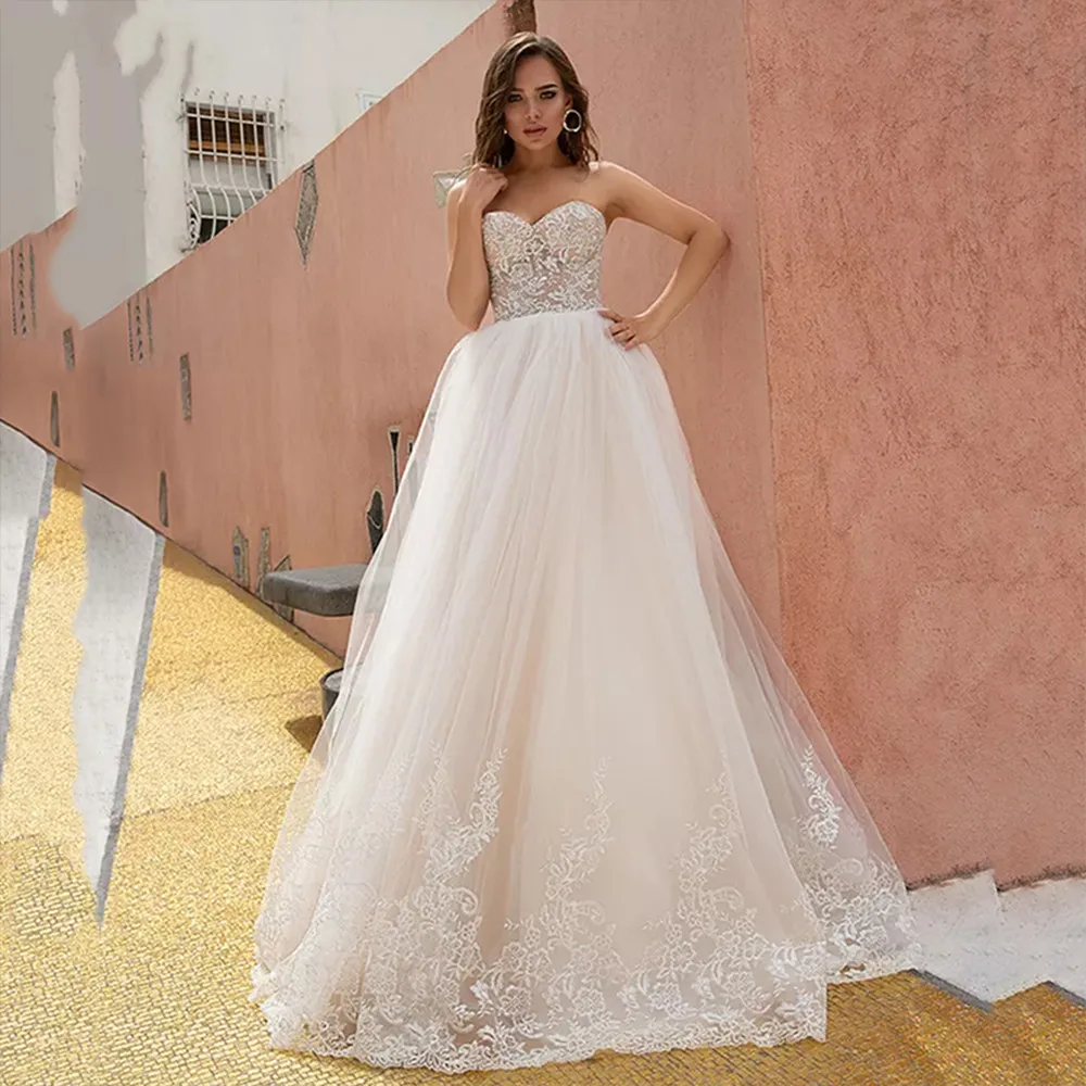 

Sexy Sweetheart Wedding Dress Appliques Sleeveless A-Line Bride Gown Lace Back Robe De Mariée With Corset Sweep Train Tulle