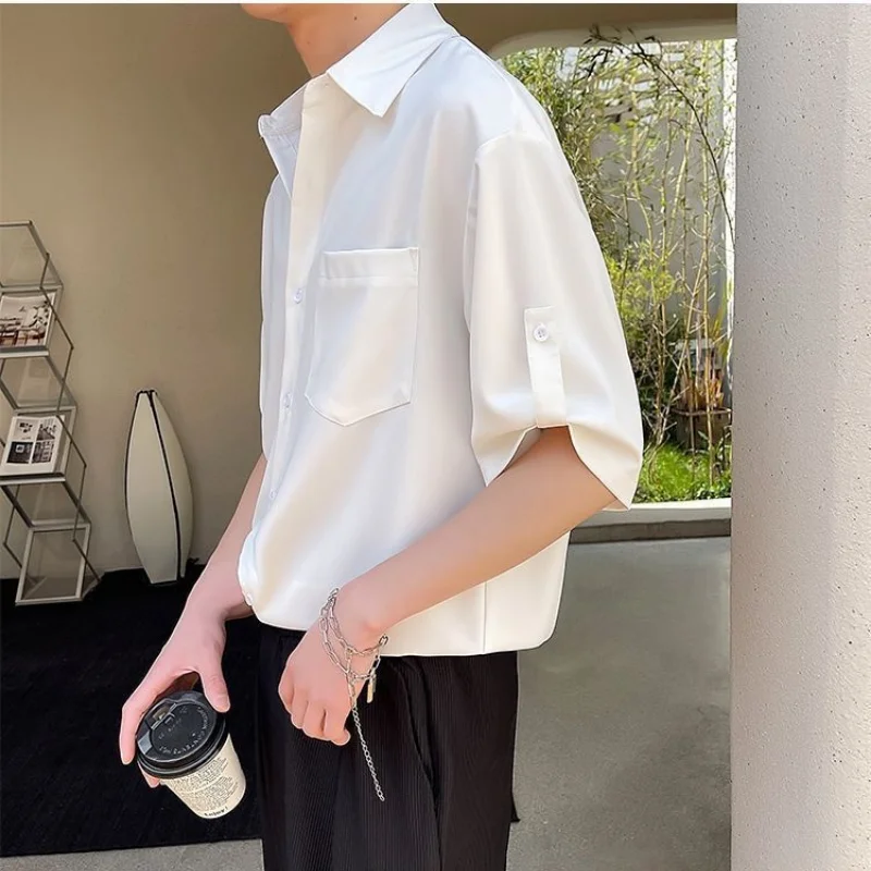 Men's Korean White Button Blouse Summer New Half Sleeve Polo Neck Pockets Solid Loose Shirt Tops Fashion Trend Men Clothing
Men's Korean White Button Blouse Summer New Half Sleeve Polo Neck Pockets Solid Loose Shirt Tops Fashion Trend Men Clothing