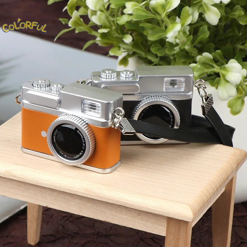 1Pc Mini Camera Model Dollhouse Miniature Retro Camera Model Decor Toy Can Shine
1Pc Mini Camera Model Dollhouse Miniature Retro Camera Model Decor Toy Can Shine