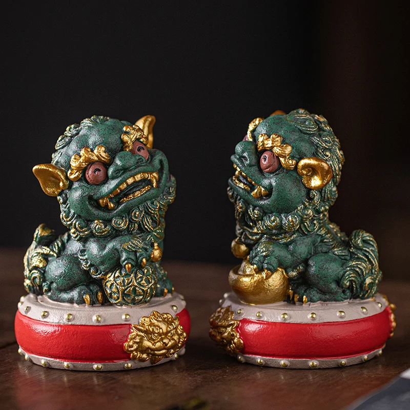 

A pair of lucky embroidered ball, gemstone, lion, and accompanying hand gifts