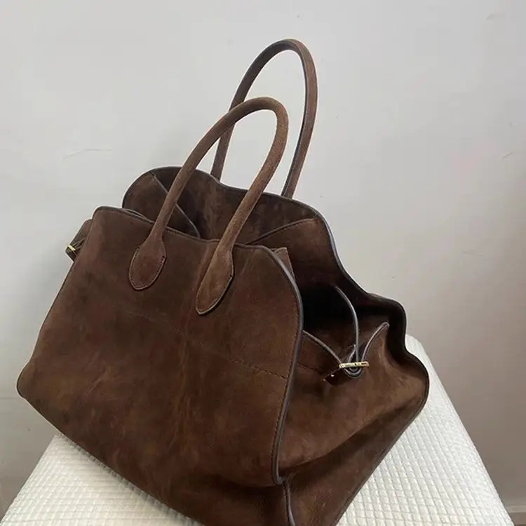 Tote Bag Women's 2024 New High end Women's Luxury Simple Designer Large Capacity Shoulder Bag Retro Unique personality Handbag
Tote Bag Women's 2024 New High end Women's Luxury Simple Designer Large Capacity Shoulder Bag Retro Unique personality Handbag