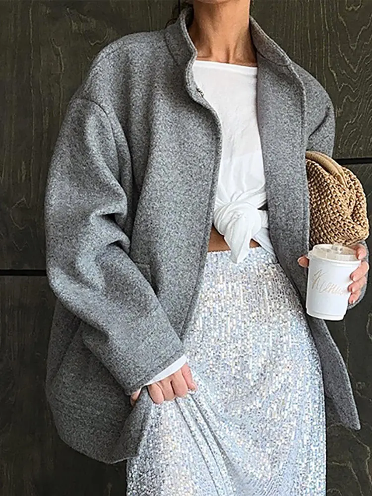 Women Elegant Solid Woolen Jacket Casual Loose Standing Collar Long Seeevd Cardigan Top 2023 Autumn Winter Lady High Streetwear
Women Elegant Solid Woolen Jacket Casual Loose Standing Collar Long Seeevd Cardigan Top 2023 Autumn Winter Lady High Streetwear
