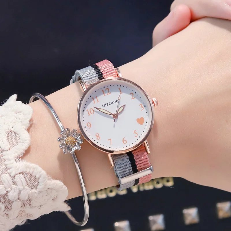 Fashion Casual Waterproof Sports Analog Quartz Watch Luxury Watches Fabric Belt Stainless Steel Dial Quartz Watch for Women
Fashion Casual Waterproof Sports Analog Quartz Watch Luxury Watches Fabric Belt Stainless Steel Dial Quartz Watch for Women