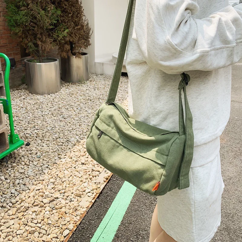 Canvas bag Women's casual shoulder bag ins Korean version literary style mobile phone bag minimalist crossbody bag
Canvas bag Women's casual shoulder bag ins Korean version literary style mobile phone bag minimalist crossbody bag