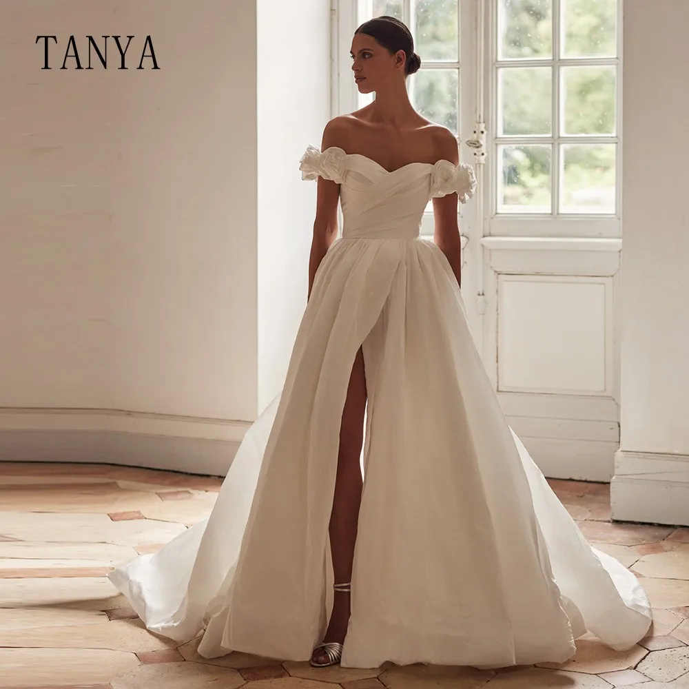 Элегантное свадебное платье с открытыми плечами со съемной накидкой с высоким разрезом трапециевидной формы из тафты со шлейфом Свадебное платье TSWD358 
Элегантное свадебное платье с открытыми плечами со съемной накидкой с высоким разрезом трапециевидной формы из тафты со шлейфом Свадебное платье TSWD358