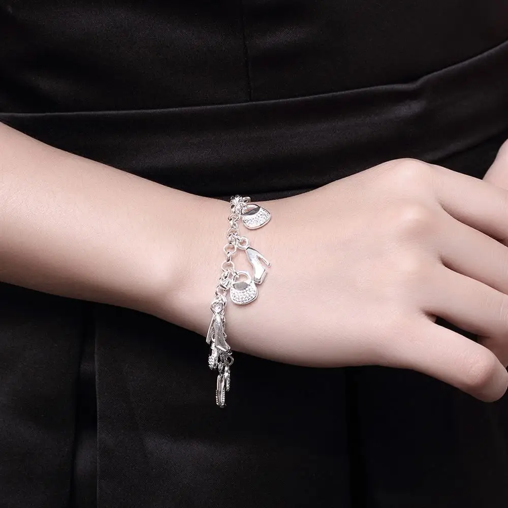925 Sterling silver Bracelets fashion Shoe bag shopping chain for woman Wedding party Christmas Gift high quality Jewelry
925 Sterling silver Bracelets fashion Shoe bag shopping chain for woman Wedding party Christmas Gift high quality Jewelry