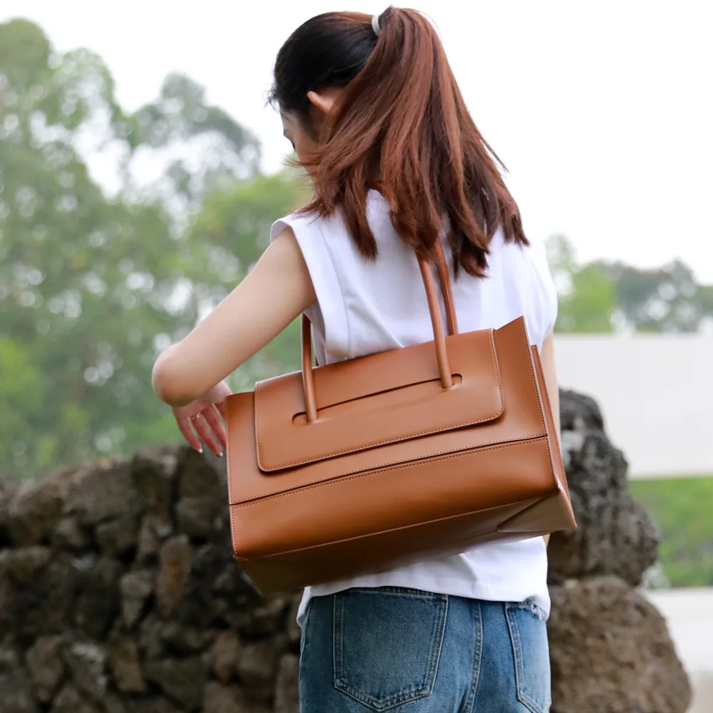 Genuine Leather Women's Bag Simple One Shoulder Underarm Bag Casual Large Capacity Cowhide Laptop Commuter Bag
Genuine Leather Women's Bag Simple One Shoulder Underarm Bag Casual Large Capacity Cowhide Laptop Commuter Bag