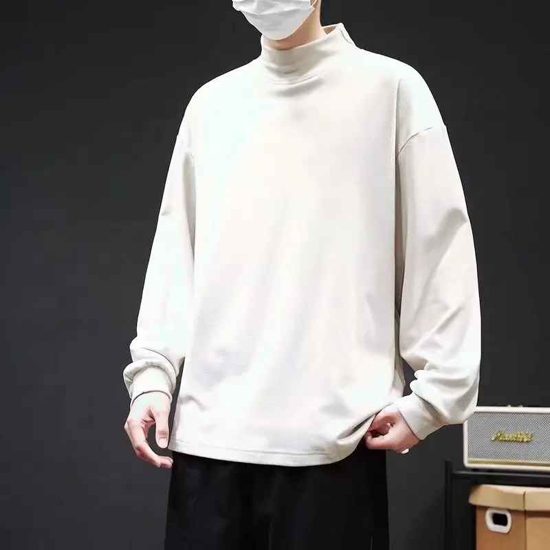 Korean Casual Simple Fashion Autumn Winter New Warm T-shirt Men's Solid Half High Neck Fleece Loose Versatile Long Sleeved Top
Korean Casual Simple Fashion Autumn Winter New Warm T-shirt Men's Solid Half High Neck Fleece Loose Versatile Long Sleeved Top