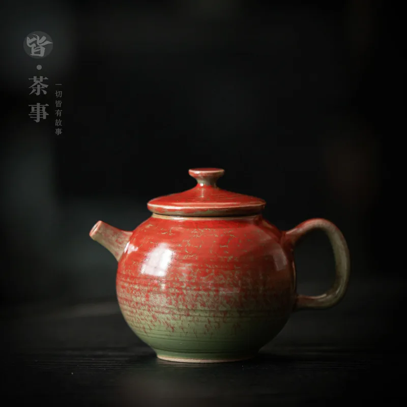 Retro ceramic teapot creative pomegranate red home Kung Fu tea set small single pot Chinese living room office teapot.
Retro ceramic teapot creative pomegranate red home Kung Fu tea set small single pot Chinese living room office teapot.