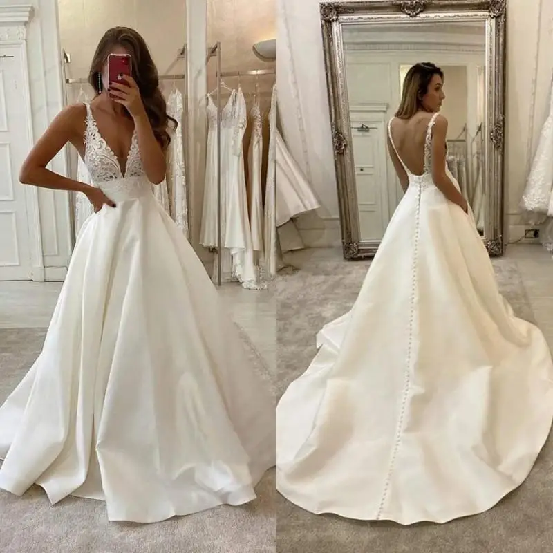 FDY Satin A Line Wedding Dresses with Buttons Sexy Open Back Vestidos De Novia V Neck Lace Sleeveless Bride Wedding Gowns
FDY Satin A Line Wedding Dresses with Buttons Sexy Open Back Vestidos De Novia V Neck Lace Sleeveless Bride Wedding Gowns
