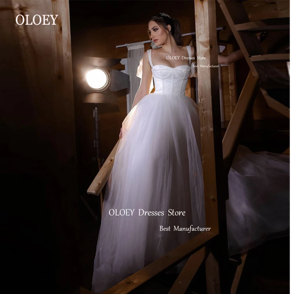 OLOEY Glitter A Line Wedding Dresses Sweetheart Straps Tulle Floor Length Country Bride Gowns Shiny Vestido de noiva
OLOEY Glitter A Line Wedding Dresses Sweetheart Straps Tulle Floor Length Country Bride Gowns Shiny Vestido de noiva