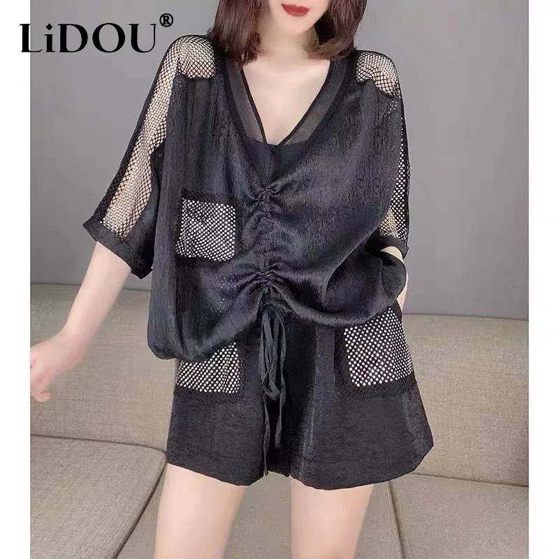 2023 Summer New Black Women's Set V-neck Pockets Half Sleeve Drawstring Hollow Out T-Shirts + Elastic Waist Fashion Loose Shorts 
2023 Summer New Black Women's Set V-neck Pockets Half Sleeve Drawstring Hollow Out T-Shirts + Elastic Waist Fashion Loose Shorts