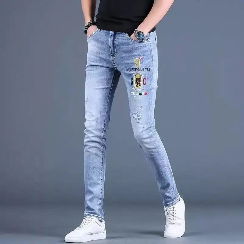 High Quality Men's Fashion Embroidery Denim Pants Ripped Decoration Casual Jeans Classic Slim Style Blue Stretch Trousers;
High Quality Men's Fashion Embroidery Denim Pants Ripped Decoration Casual Jeans Classic Slim Style Blue Stretch Trousers;