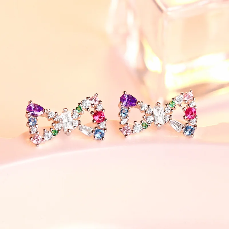 New fashion trend S925 silver inlaid 5A zircon bow girl color earrings with high-quality temperament
New fashion trend S925 silver inlaid 5A zircon bow girl color earrings with high-quality temperament