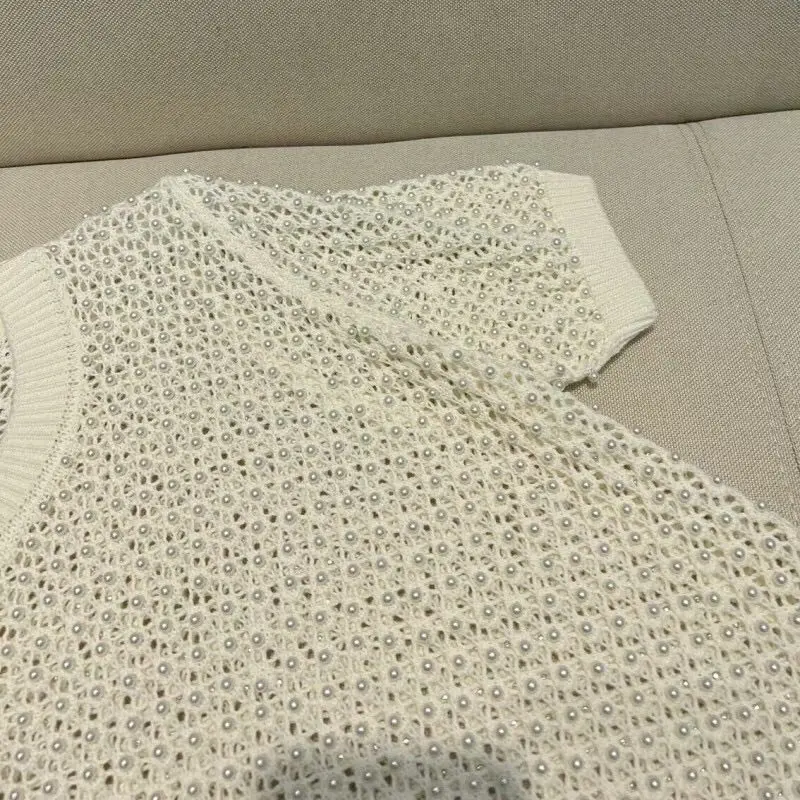 2023 Summer Designer's Heavy Work Full Body Beaded Light Luxury Short Sleeve Knitwear Sweater Women's Wool Carding Hollow Top
2023 Summer Designer's Heavy Work Full Body Beaded Light Luxury Short Sleeve Knitwear Sweater Women's Wool Carding Hollow Top