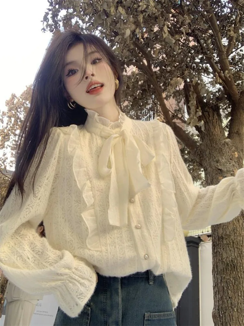 Sweet Bow Lace Up Shirt Women Korean Stand Collar Lace Splice Gentle Hollow Solid Flare Sleeve Temperament Autumn Female Top
Sweet Bow Lace Up Shirt Women Korean Stand Collar Lace Splice Gentle Hollow Solid Flare Sleeve Temperament Autumn Female Top