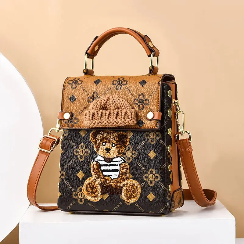 Women unique Handbag 2024 Trendy Mini Phone Box Bag Small Shoulder Bag Girl purse Cute Personalized Bear design Crossbody Bag
Women unique Handbag 2024 Trendy Mini Phone Box Bag Small Shoulder Bag Girl purse Cute Personalized Bear design Crossbody Bag
