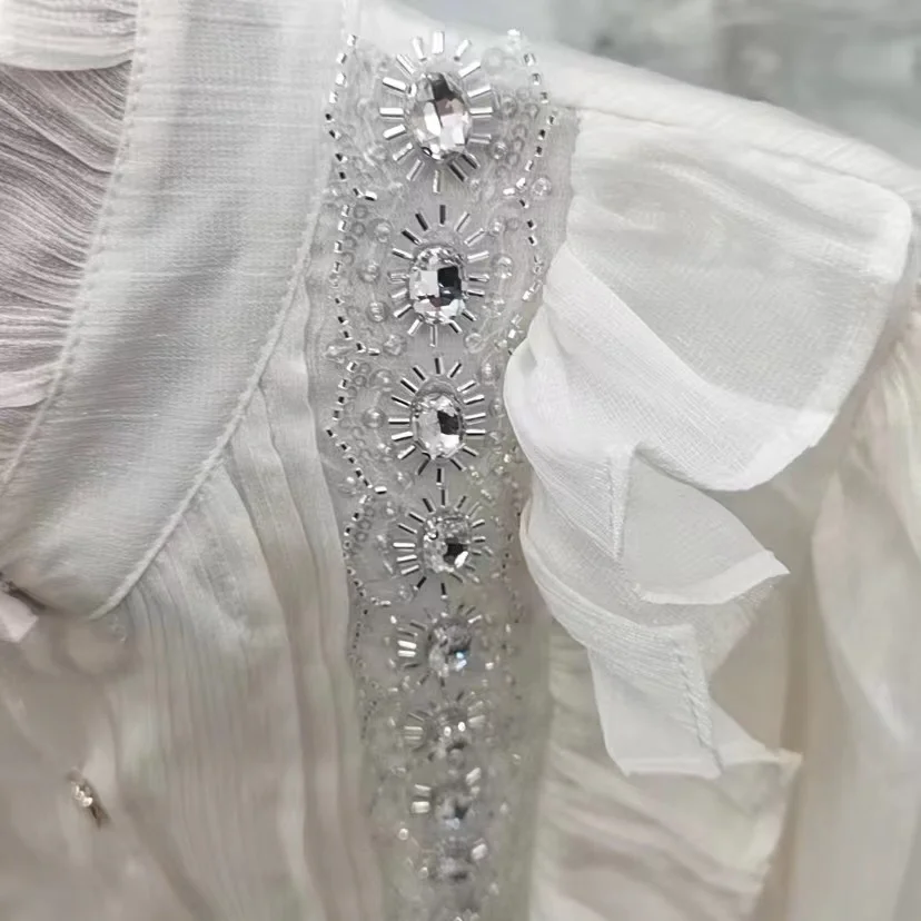 Light Luxury Beaded Diamonds Stitch Ruffles Shirts and Blouses For Women 2024 Spring Long Sleeve White Chiffon Tops Blusas
Light Luxury Beaded Diamonds Stitch Ruffles Shirts and Blouses For Women 2024 Spring Long Sleeve White Chiffon Tops Blusas