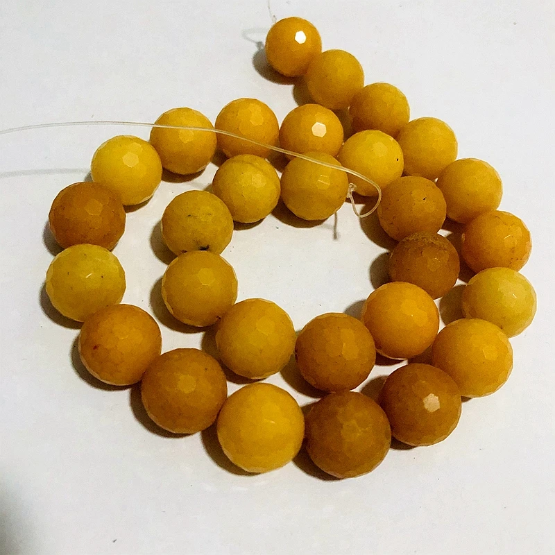 Оптовая продажа, бусины из натурального желтого нефрита, 14 мм, граненые круглые бусины из драгоценного камня, бусины россыпью для ювелирных изделий, нитка 15,5 дюйма
Оптовая продажа, бусины из натурального желтого нефрита, 14 мм, граненые круглые бусины из драгоценного камня, бусины россыпью для ювелирных изделий, нитка 15,5 дюйма