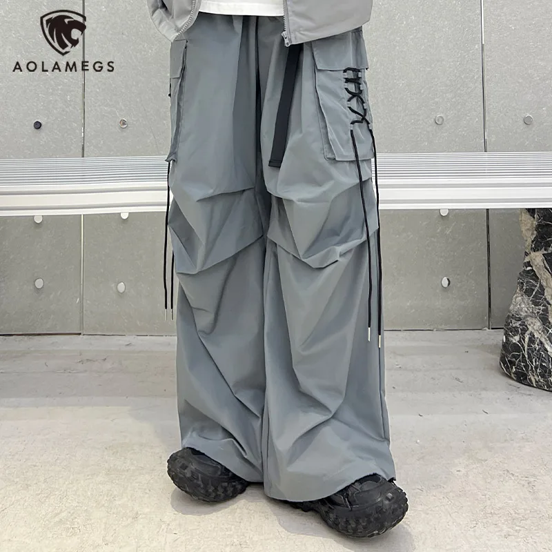 Hip Hop Men Cross Lace Ribbon Patch Pockets Pleated Sweatpant Oversized Straight Elastic Waist Pant Hit Color Belt Men and Women
Hip Hop Men Cross Lace Ribbon Patch Pockets Pleated Sweatpant Oversized Straight Elastic Waist Pant Hit Color Belt Men and Women