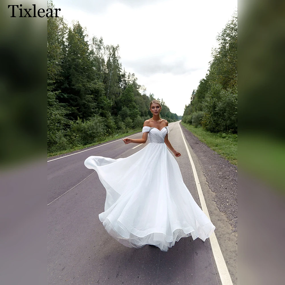 Женское свадебное платье с открытыми плечами TIXLEAR, ТРАПЕЦИЕВИДНОЕ платье с открытой спиной и кристаллами, расшитое бисером, 2023
Женское свадебное платье с открытыми плечами TIXLEAR, ТРАПЕЦИЕВИДНОЕ платье с открытой спиной и кристаллами, расшитое бисером, 2023
