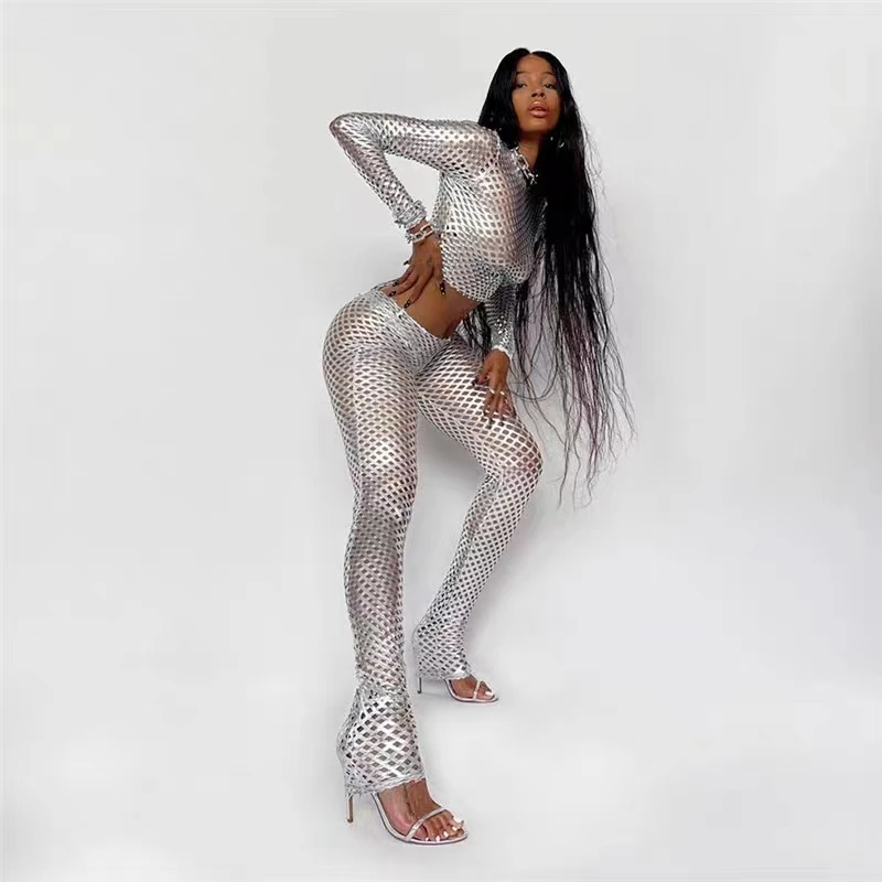 Cyberpunk hollow hole silver bright top European and American fashionable slim trousers suit
Cyberpunk hollow hole silver bright top European and American fashionable slim trousers suit