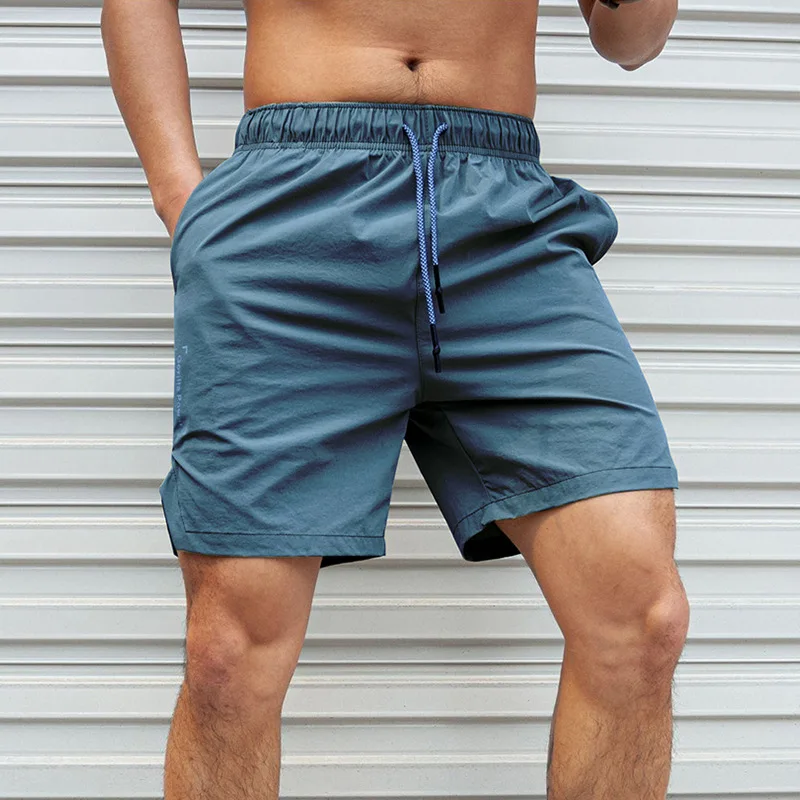New Sports Quick Drying Shorts Men's Casual Fitness Exercise Running Five Quarter Pants Big Size Absorbent Sweat Wave Brand
New Sports Quick Drying Shorts Men's Casual Fitness Exercise Running Five Quarter Pants Big Size Absorbent Sweat Wave Brand
