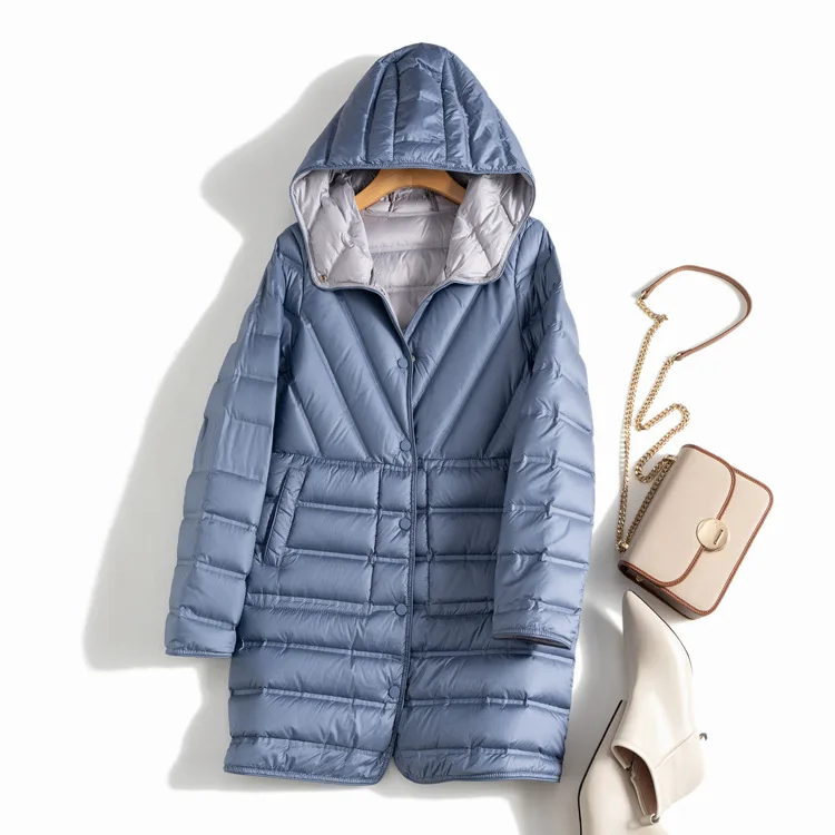 Double-sided wearable medium length adhesive line loose small straight tube hooded casual white duck down jacket
Double-sided wearable medium length adhesive line loose small straight tube hooded casual white duck down jacket