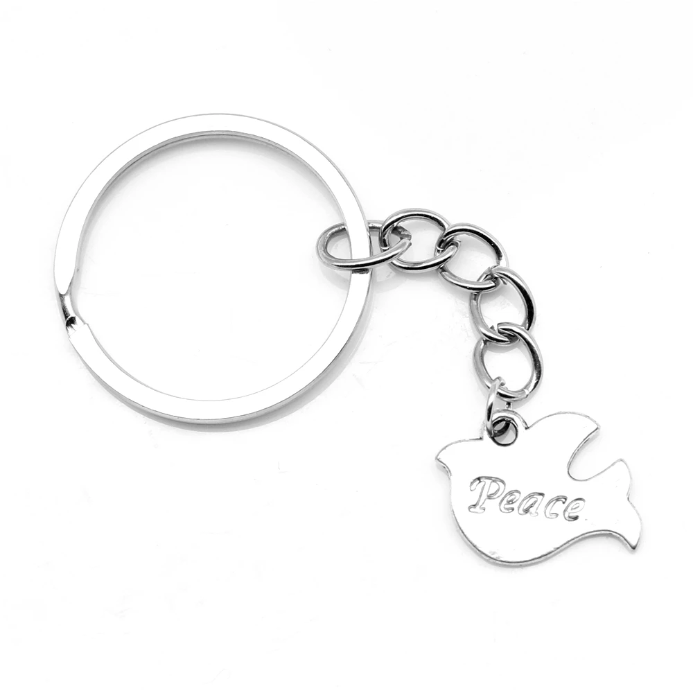 1pcs Antique Silver Color 15x20mm Peace Dove Keychain Handmade Jewerly Diy 
1pcs Antique Silver Color 15x20mm Peace Dove Keychain Handmade Jewerly Diy