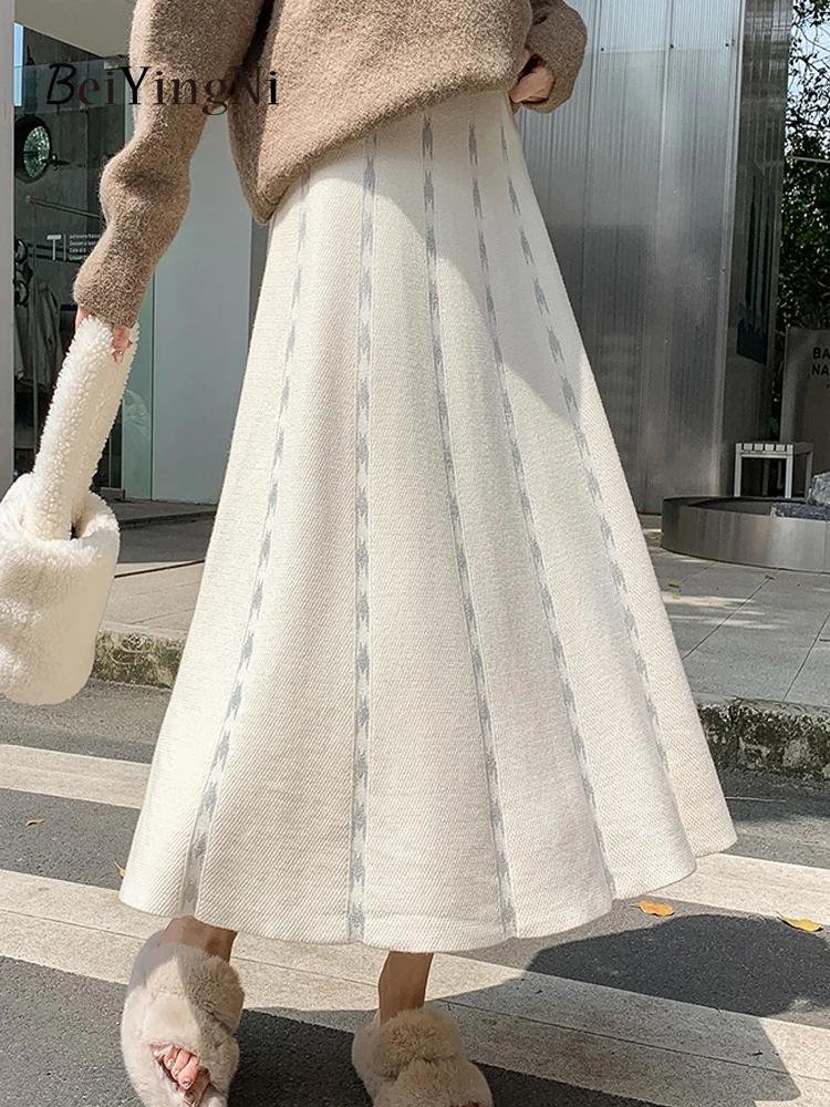 Beiyingni 2023 Autumn Winter Thick A-line Skirt Women Korean Fashion Chic High Waist Pleated Long Midi Skirts for Ladies Faldas 
Beiyingni 2023 Autumn Winter Thick A-line Skirt Women Korean Fashion Chic High Waist Pleated Long Midi Skirts for Ladies Faldas