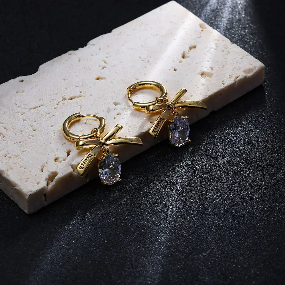CARLIDANA Sweet Fashion Cute Pure Delicate Zircon Mini Bow tie Crystal Gold Plated Stud Earrings For Women Girls Jewelry
CARLIDANA Sweet Fashion Cute Pure Delicate Zircon Mini Bow tie Crystal Gold Plated Stud Earrings For Women Girls Jewelry