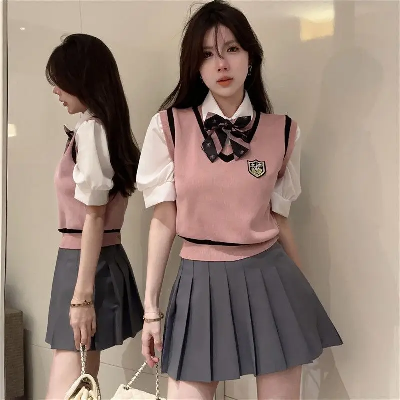 

2024 Japan and Korea Academy style sweet set women's two-piece bubble sleeve patchwork top high waisted pleated skirt JK set