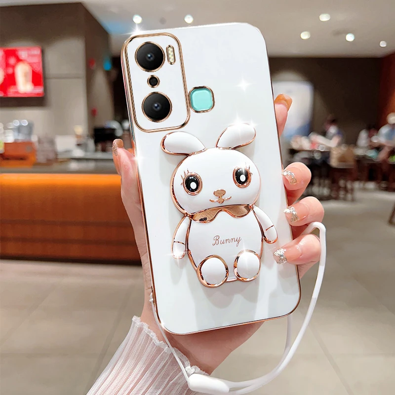 For Infinix Hot 20i Phone Case Cute Cartoon Rabbit Fold Stand With Lanyard Soft Silicone Luxury Plating Cover
For Infinix Hot 20i Phone Case Cute Cartoon Rabbit Fold Stand With Lanyard Soft Silicone Luxury Plating Cover