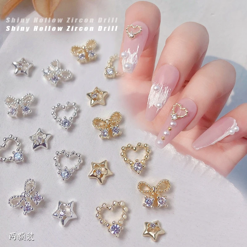 2pcs/lot metal nail rhinestones gold silver alloy Hollowe heart star bow gliter zircon diamond pearls nail jewellery HZ065
2pcs/lot metal nail rhinestones gold silver alloy Hollowe heart star bow gliter zircon diamond pearls nail jewellery HZ065
