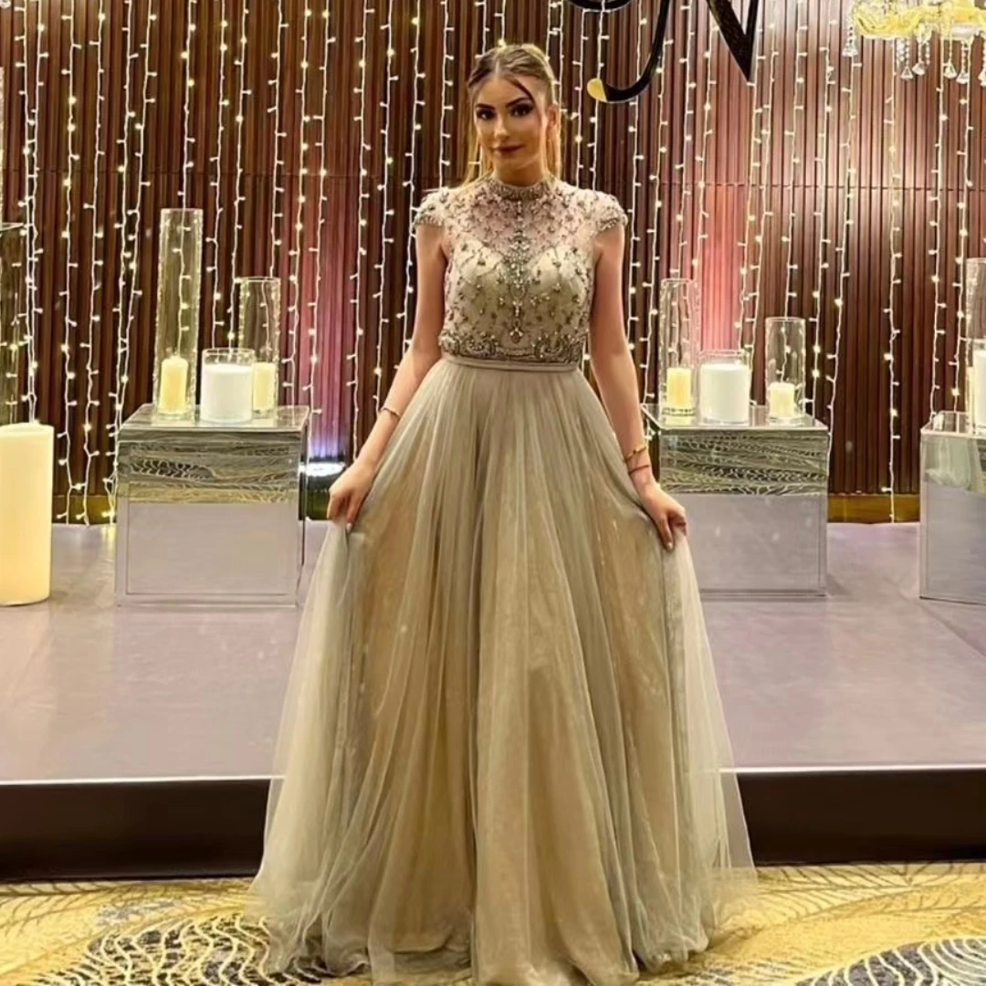 VD Luxury Beaded Capped Sleeves Prom Dresses High Collar Zipper Back Evening Party Bride Wear A Line Tulle Vestidos De Novia
VD Luxury Beaded Capped Sleeves Prom Dresses High Collar Zipper Back Evening Party Bride Wear A Line Tulle Vestidos De Novia