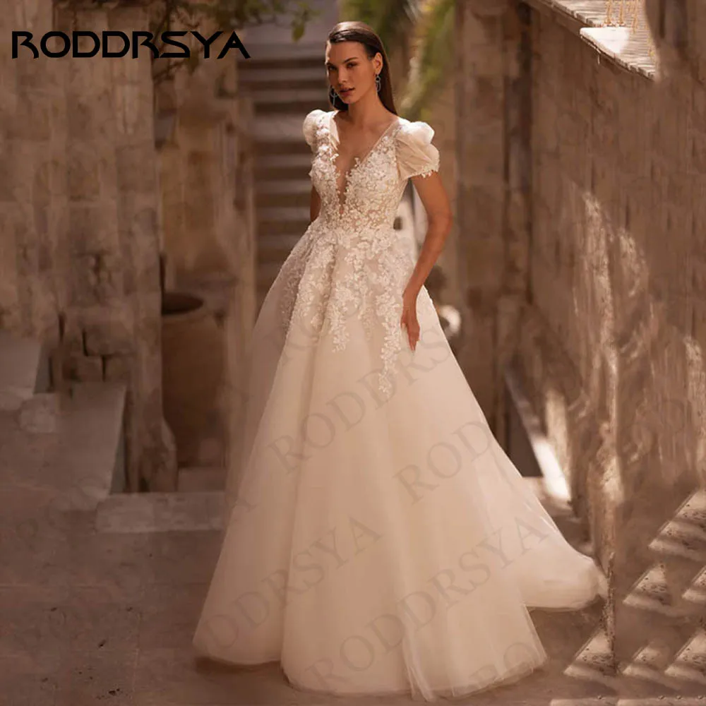 RODDRSYA Puff Sleeves Wedding Dresses For Woman Lace suknia ślubna Princess V Neck Tulle Backless Appliques A Line Bridal Gown
RODDRSYA Puff Sleeves Wedding Dresses For Woman Lace suknia ślubna Princess V Neck Tulle Backless Appliques A Line Bridal Gown